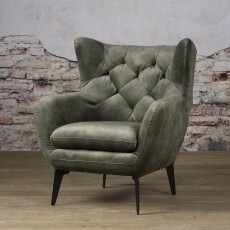 Fauteuil Bomba in velvet stof met vintage uitstraling.